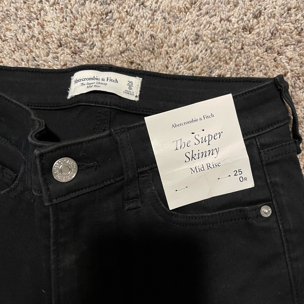 NWT black skinny jeans